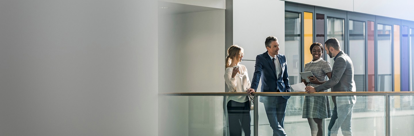 Business people talking in office background